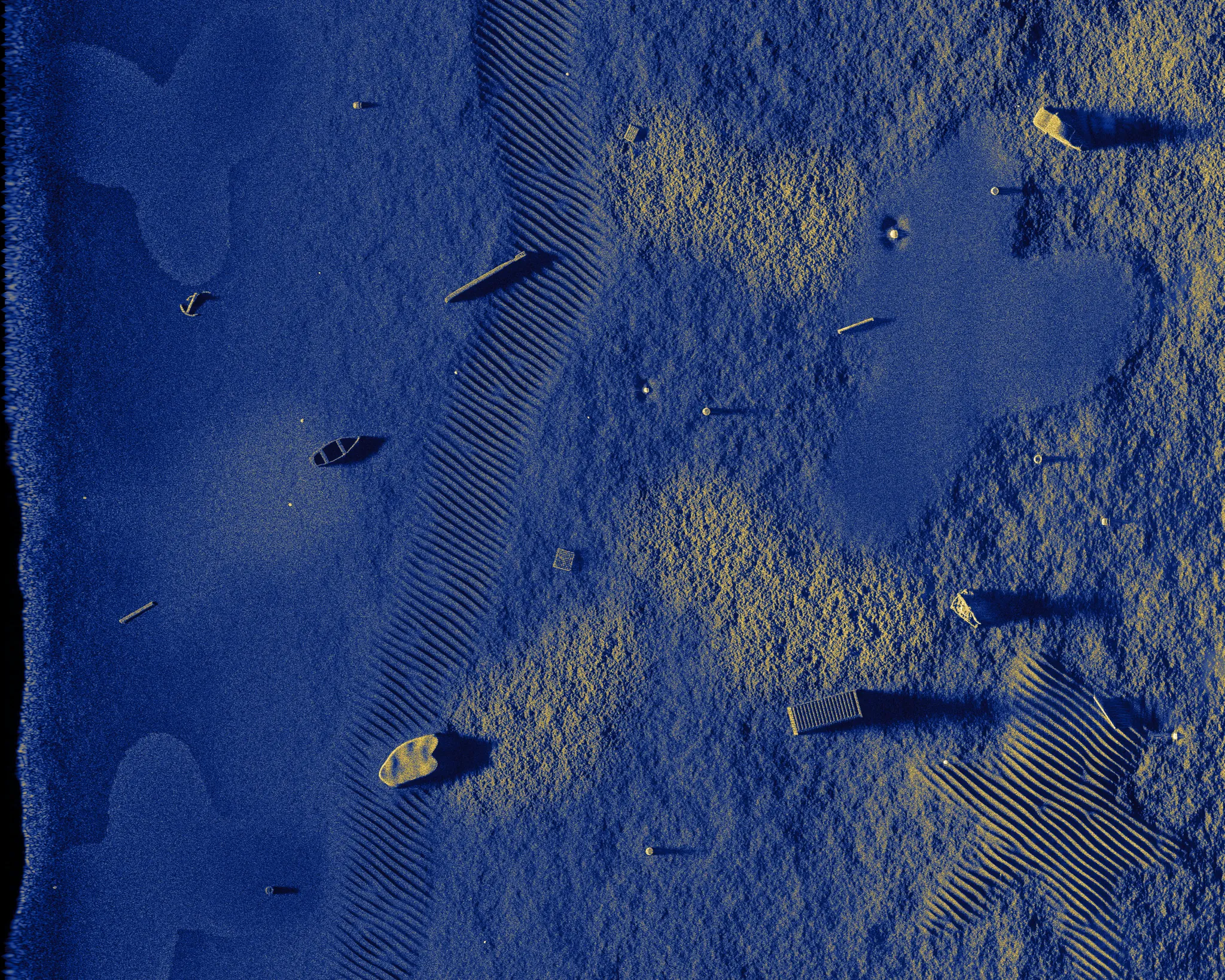 Synthetic aperture sonar image of a mixed seafloor with eighteen objects simulated as point scatterers; every object appears as a uniformly bright, speckled silhouette with its shadow